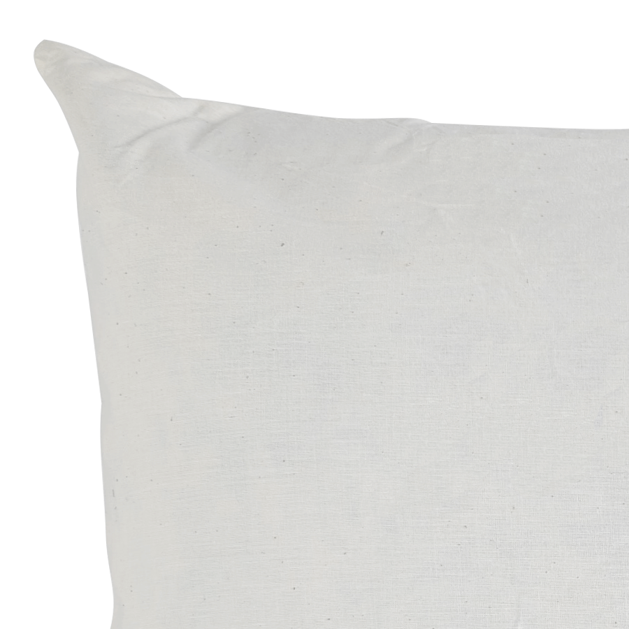 Gros plan sur le tissu en coton blanc du coussin intérieur.