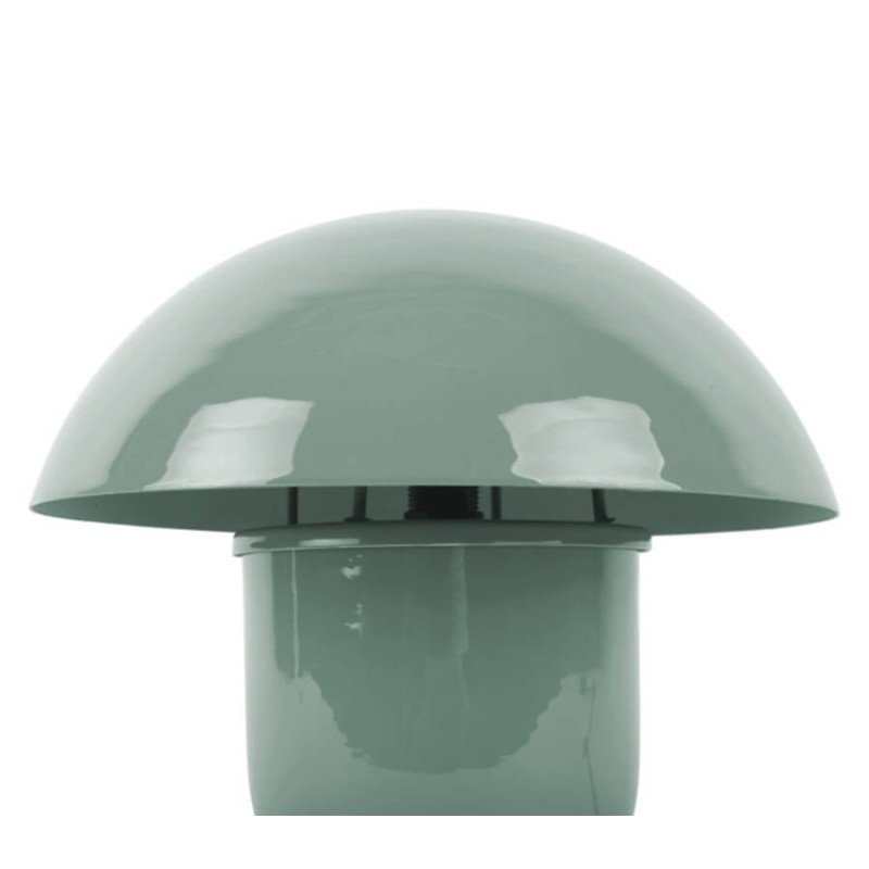 Détail de la silhouette iconique et de la finition laquée brillante vert doux.