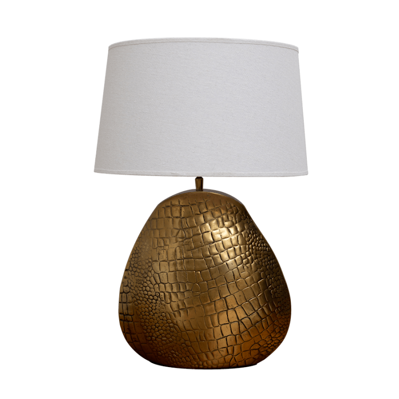 Lampe à poser avec pied effet croco doré et abat-jour en lin beige.