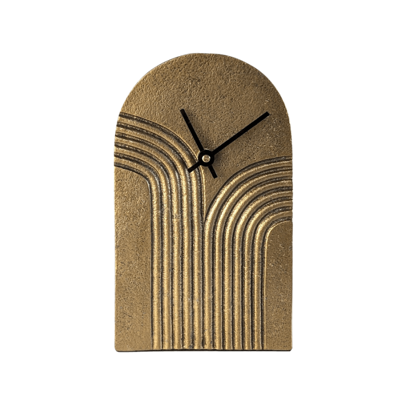 Horloge à poser en métal doré patiné H20 cm