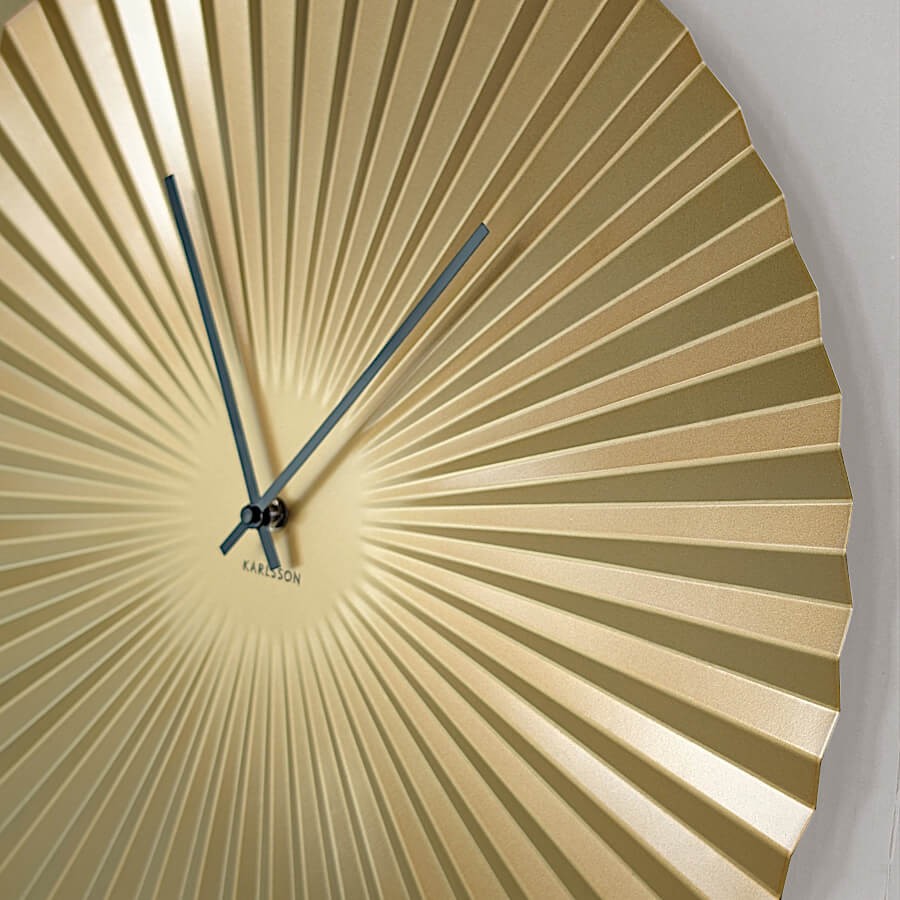 Horloge murale dorée D50 cm - La Rayonnante