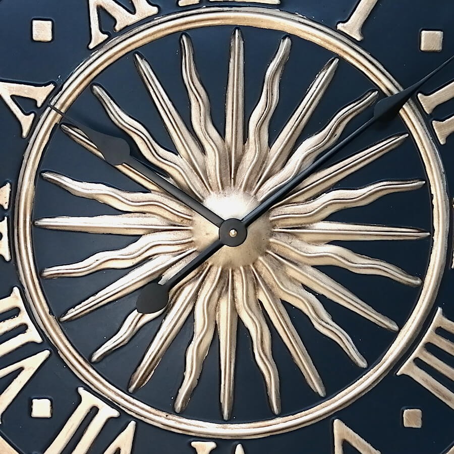 Horloge murale en métal Soleil bleu D55 cm