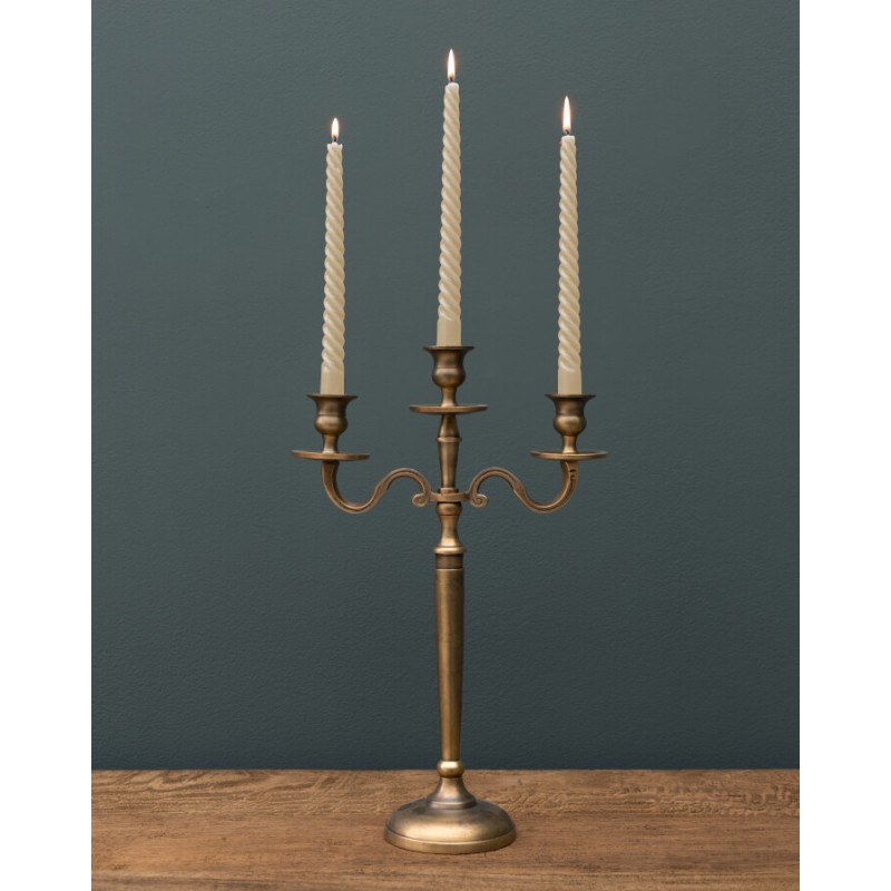 Candélabre à trois branches, idéal pour une décoration théâtrale et feutrée.