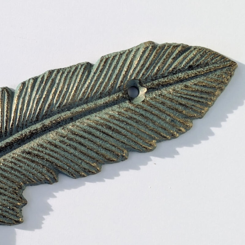 Patère plume fonte gris doré H21.5  | Deco-Delight.com