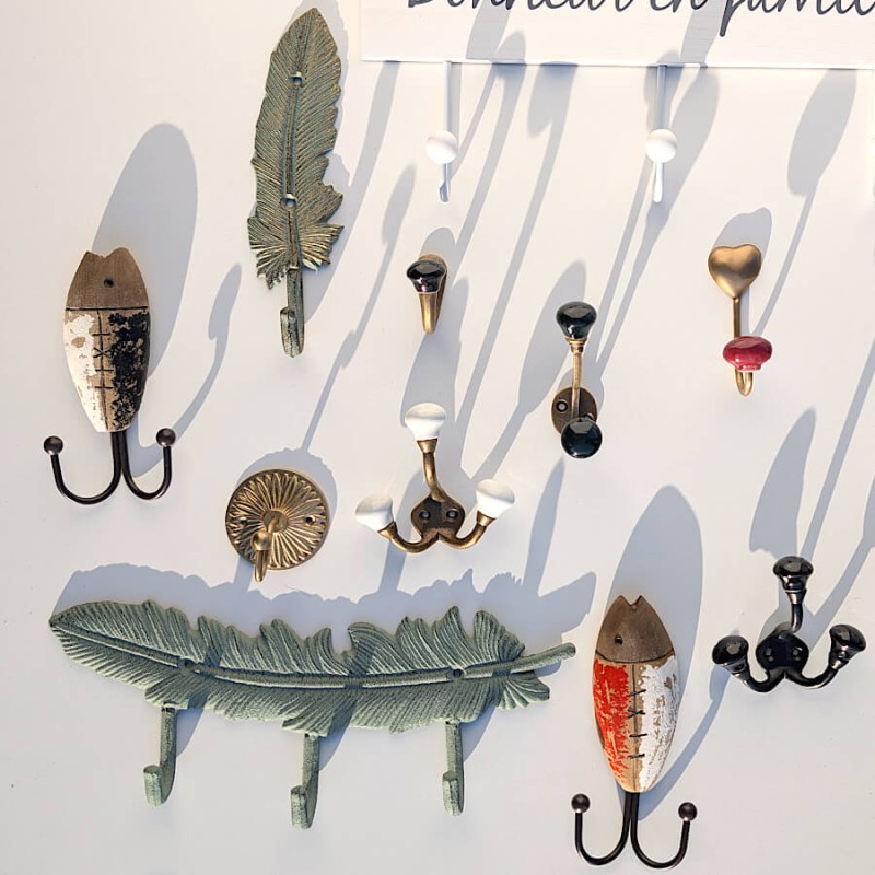 Patère plume fonte gris doré H21.5  | Deco-Delight.com