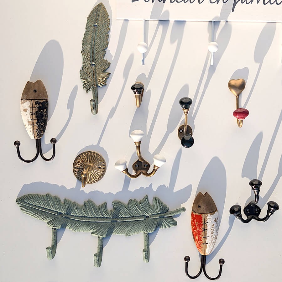 Patère plume fonte gris doré H21.5  | Deco-Delight.com