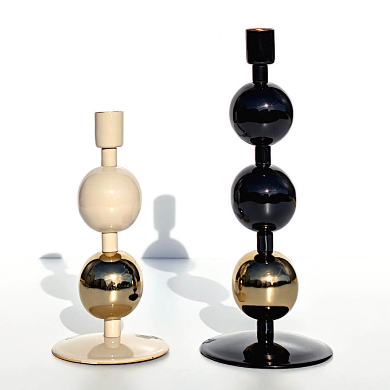 Duo de bougeoirs sphériques Art Déco crème et or et noir et or.