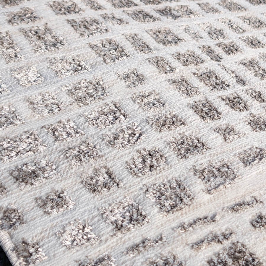 Focus sur le jeu de contrastes entre les fibres grises et blanches.