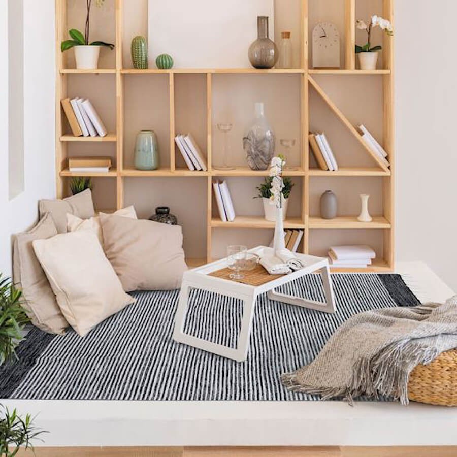 Tapis 100% coton au design ethnique créant une ambiance zen et cocooning.