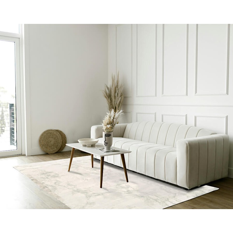 Tapis marbré blanc et gris dans un salon design contemporain.