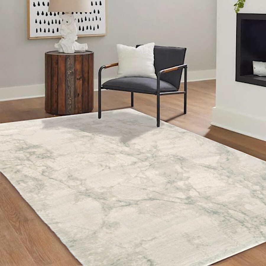 Tapis chic effet marbre créant une ambiance sophistiquée en chambre.