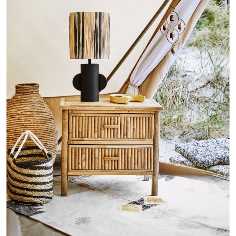 Tapis ethnique utilisé dans une chambre pour une ambiance cosy.