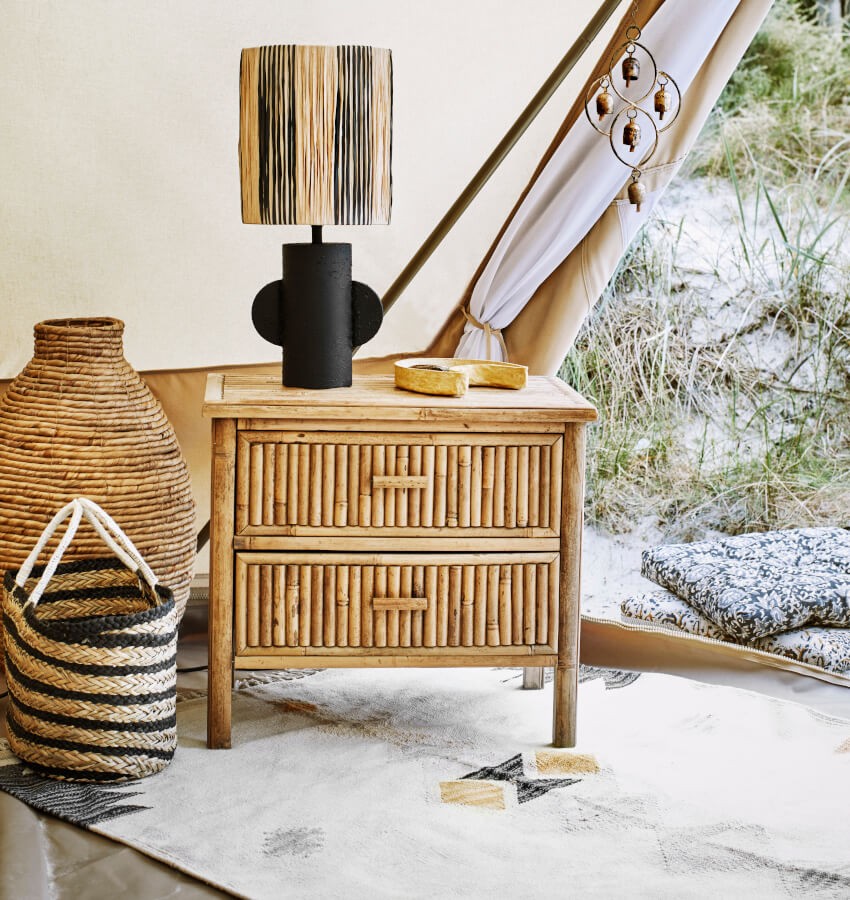 Tapis ethnique utilisé dans une chambre pour une ambiance cosy.