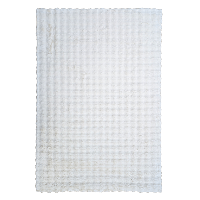 Tapis blanc 160x230 cm ultra doux à relief élégant et à l'aspect cotonneux.