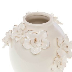 Détail du col du vase et des fleurs aux bords dorés.