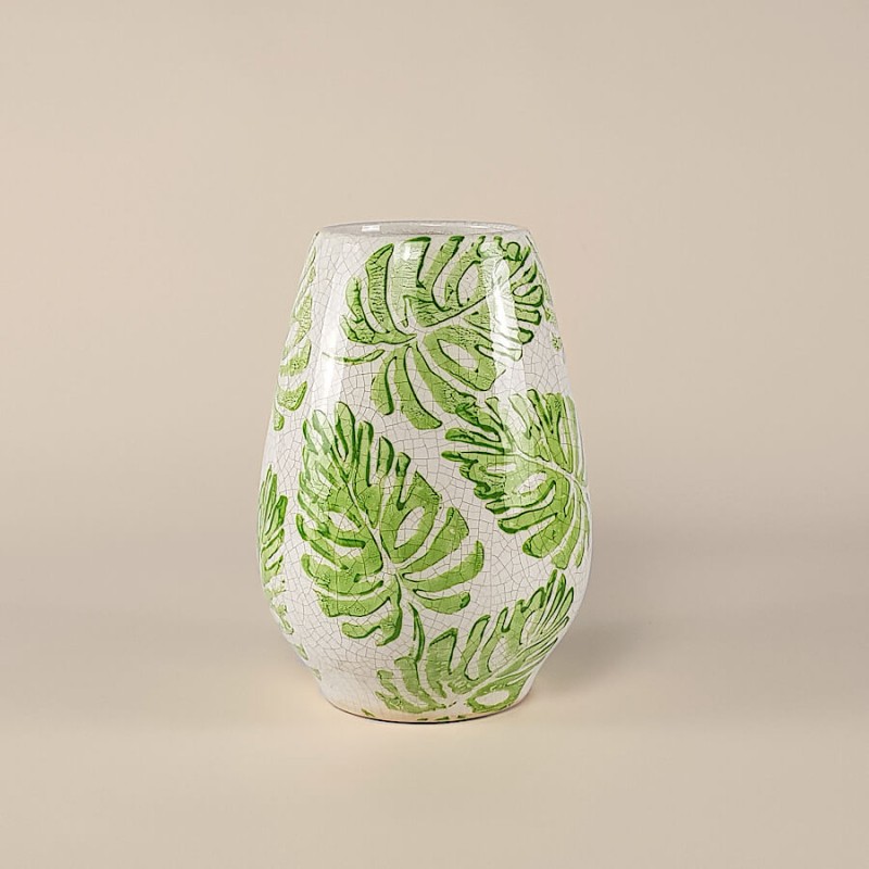 Silhouette ovoïde du vase en céramique sur fond neutre.