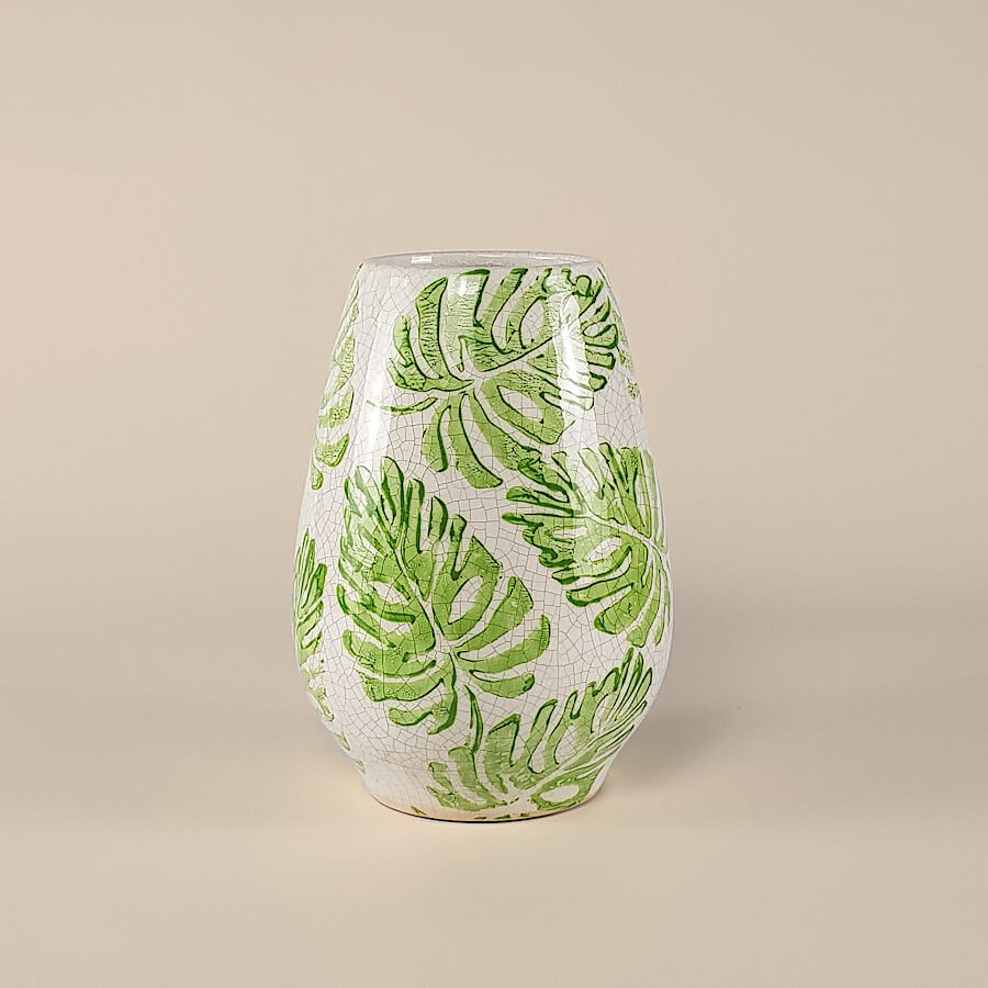 Silhouette ovoïde du vase en céramique sur fond neutre.