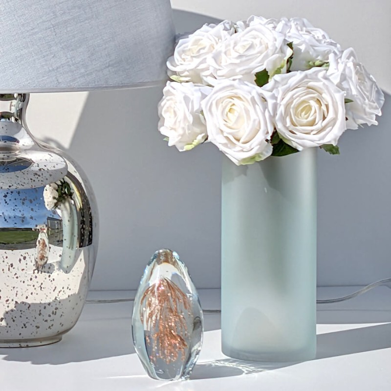 Mise en scène élégante avec la lampe mercurisée et le sulfure "Feu d'artifice" de la collection Deco-Delight.