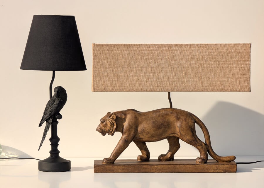 Comparaison de style entre la lampe tigre et la lampe Perroquet de la collection Deco-Delight.