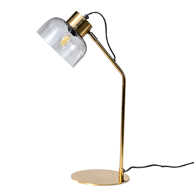 Lampe de bureau design en métal doré et abat-jour en verre gris fumé.
