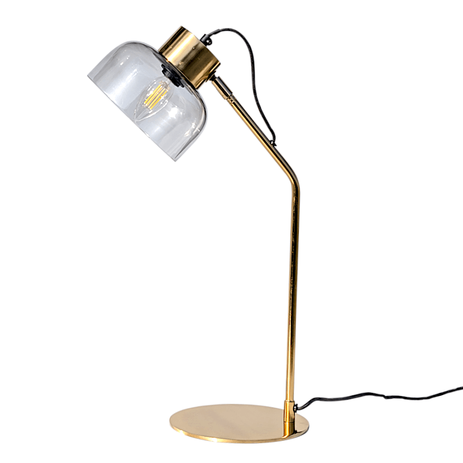 Lampe de bureau design en métal doré et abat-jour en verre gris fumé.