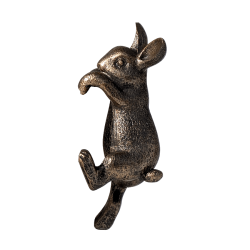 Figurine décorative lapin en résine à la patine bronzée.