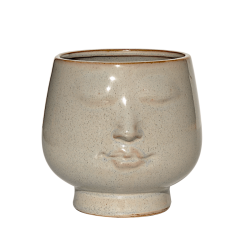 Cache-pot visage en céramique beige moucheté, vue de face.