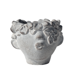 Gros plan sur le cache-pot visage "Bisou" en ciment gris.