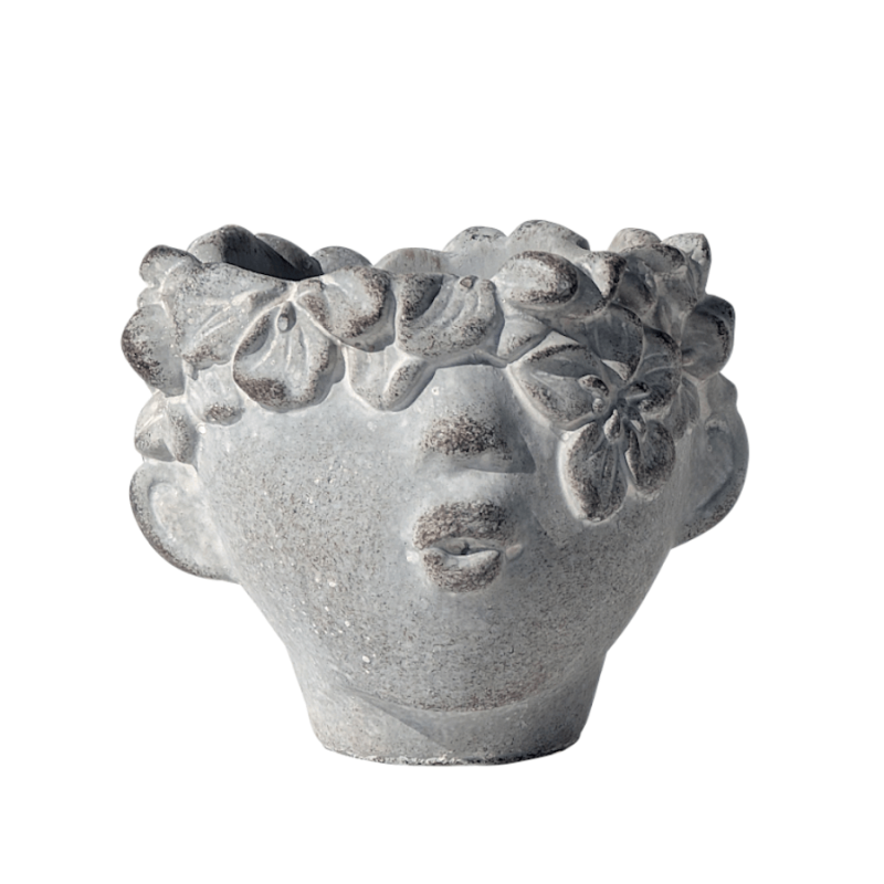 Gros plan sur le cache-pot visage "Bisou" en ciment gris.