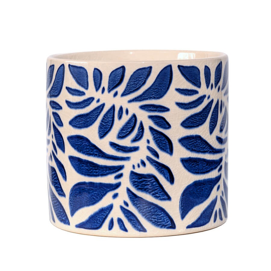 Grand cache-pot en céramique blanche aux motifs feuilles bleues.