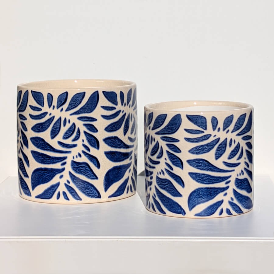 Présentation du duo : le grand modèle H13 cm et le petit H11 cm.