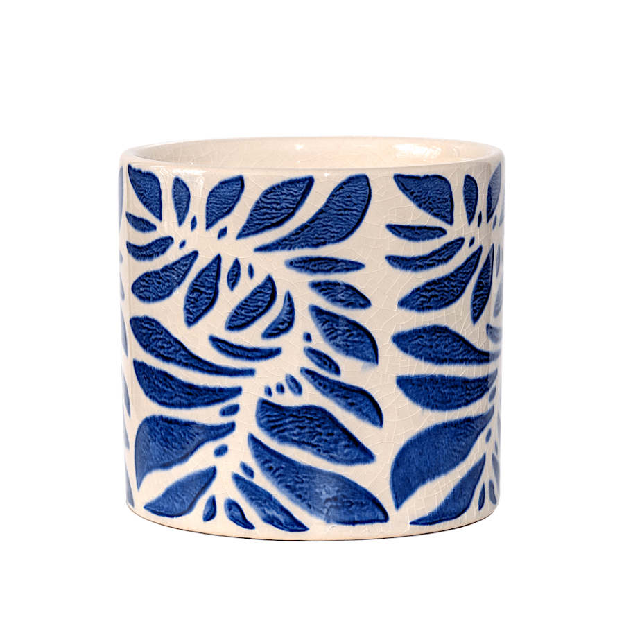 Petit cache-pot en céramique aux motifs de feuilles bleu cobalt sur blanc craquelé.