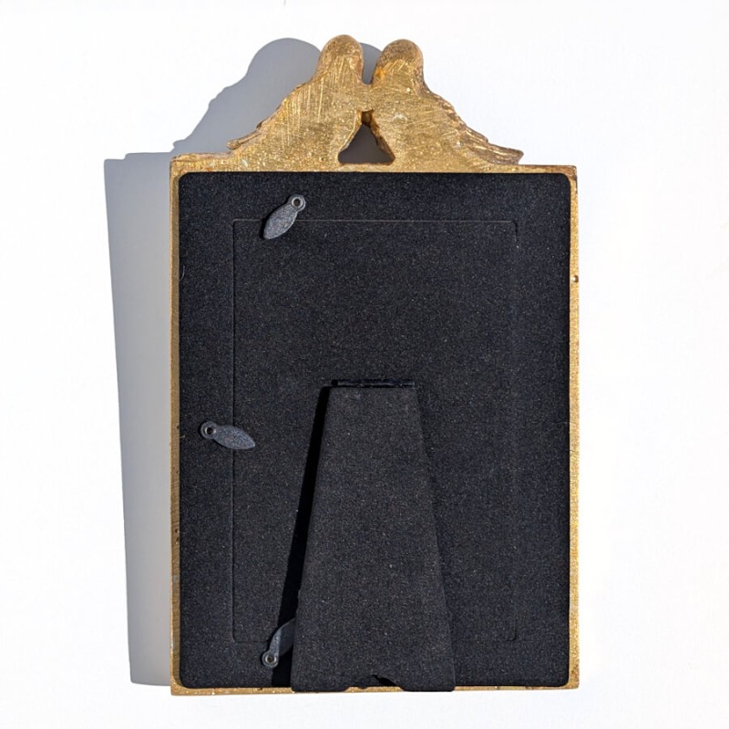 Dos du cadre présentant la finition noire soignée et le pied chevalet.