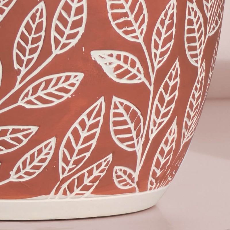 Zoom sur le design bicolore et la bordure blanche soignée du pot en céramique.