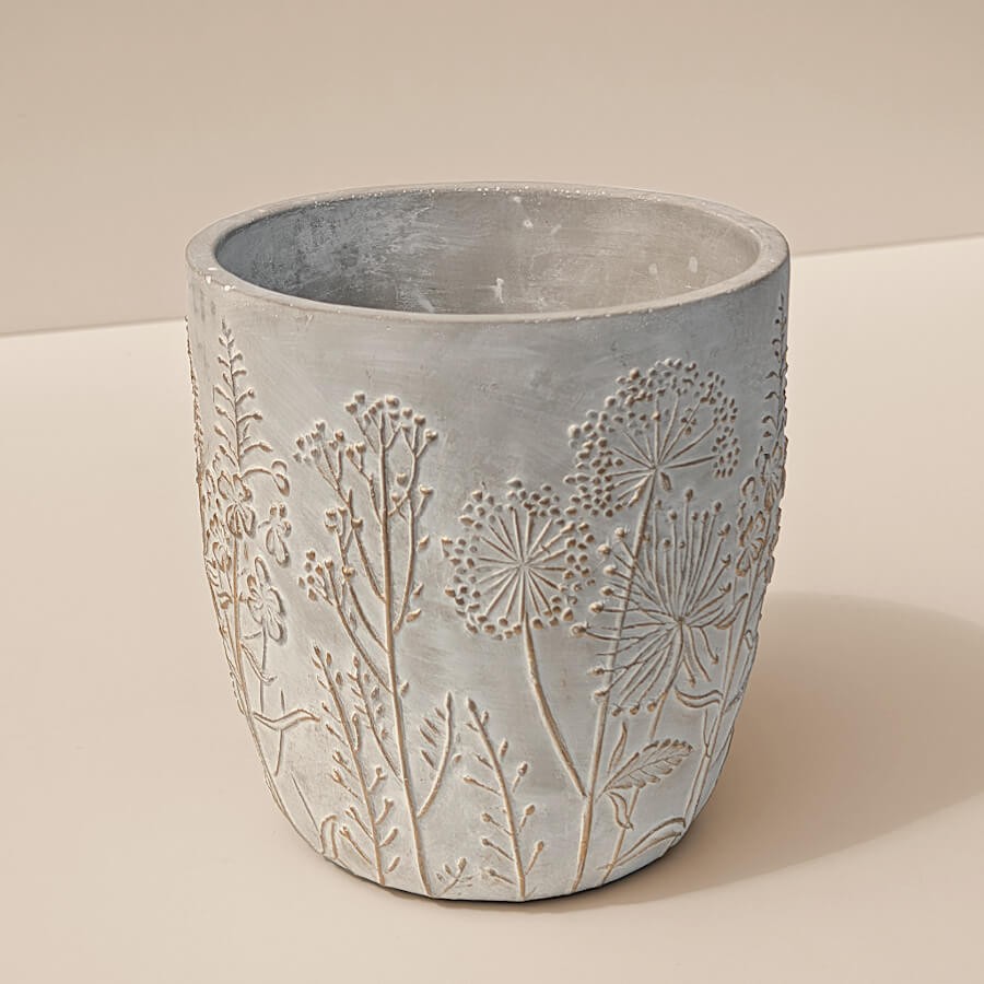 Vue de trois-quarts : Mise en avant du volume cylindrique et de la base stable du pot.