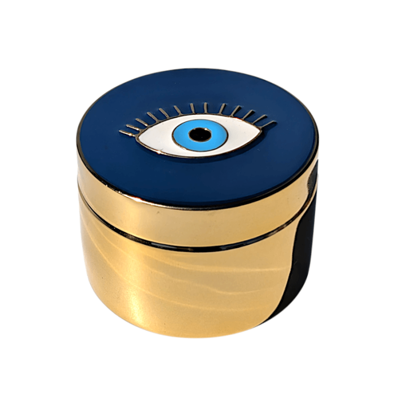 Boîte métallique dorée ronde avec couvercle émaillé bleu motif œil protecteur H7,2 cm  de Deco Delight